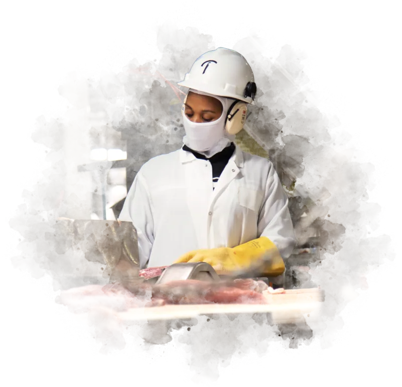 Triumph Foods team member at work on the production floor