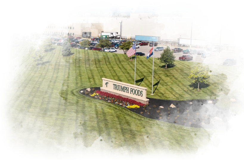 The Triumph Foods sign on the plant grounds